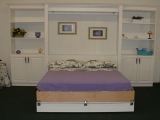 Panelbed with a cabinet on each side is a typical design